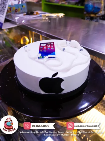 An Apple iPhone cake with the iconic logo and an edible phone screen with apps. A sleek and modern design for any tech lover.