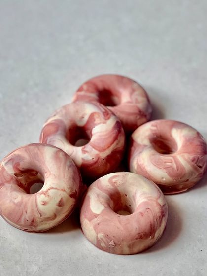 Another view of the marbled pink and white donut soaps. These are always a hit for custom gifting and special occasions.