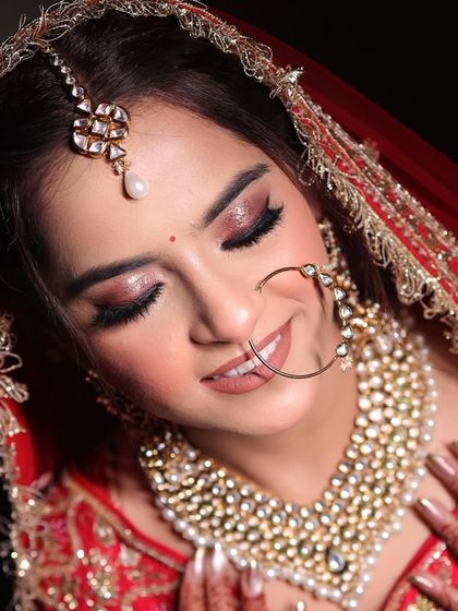 A close-up of one of my happy brides, whose kind words are a testament to the magic we create together. Her glowing skin and sparkling eyes reflect her happiness.