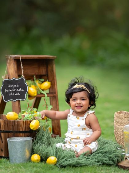 Welcome to Reya's lemonade stand! This outdoor theme is perfect for a sunny day and creates such bright, cheerful photos.