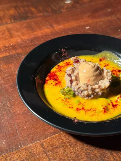 A smoked soufflé served in a rich, yellow curry with a hint of spice. This dish showcases our ability to blend classic French technique with bold, global flavours for a truly memorable entree.