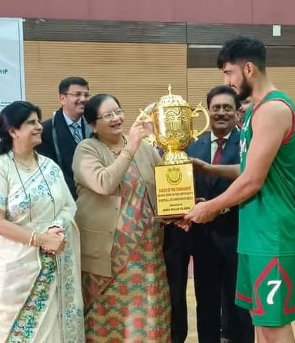 The team captain receiving the North Zone Inter-University Basketball Championship trophy from our esteemed guest. I ensure that every detail of the closing ceremony is handled professionally, from award presentation to guest felicitation.
