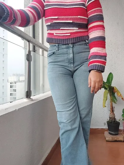 A full-length shot of the Candy Crush Pullover, styled for a casual, everyday look.