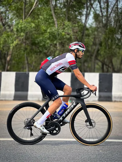 An elite rider, showing his form and fitness on the road.