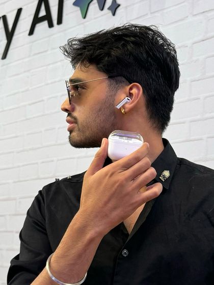 A stylish shot featuring the new Samsung Galaxy Buds. This image is part of a coordinated 'all black' look, showing how I can create a cohesive aesthetic for a product launch.