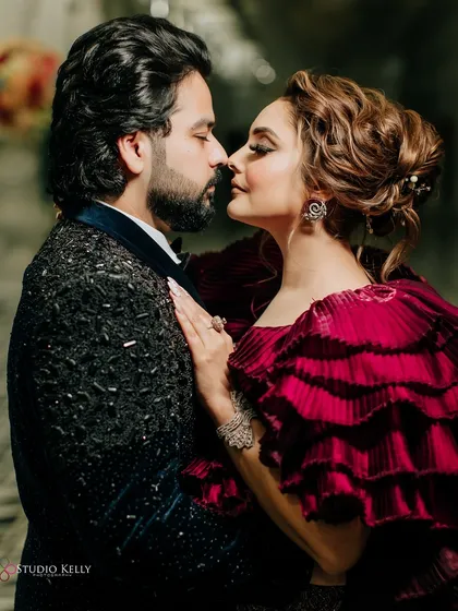 An intimate, almost-kiss portrait of the couple, capturing the romance of their engagement night.
