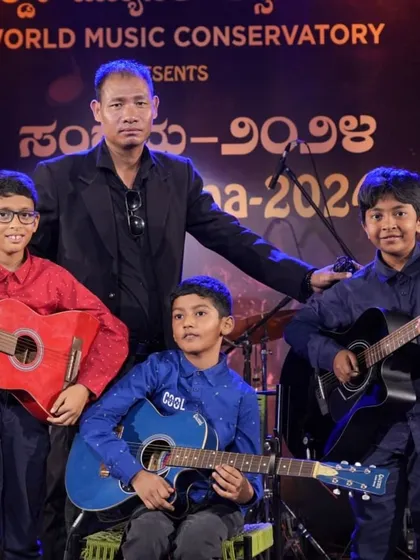 A proud moment for our young guitarists with their teacher, Mr. Along Konyak, after their tribute performance at Kalaa Sangama. We foster a strong bond between our gurus and students.