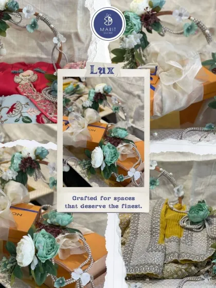 This is my 'Lux' packing style, crafted for spaces that deserve the finest. Here, I have used delicate floral arrangements and flowing ribbons to package luxury gifts for a wedding.