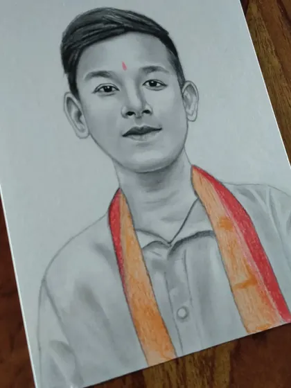 A portrait of a young boy with a colored scarf. A little bit of color can add a lot of personality to a sketch.