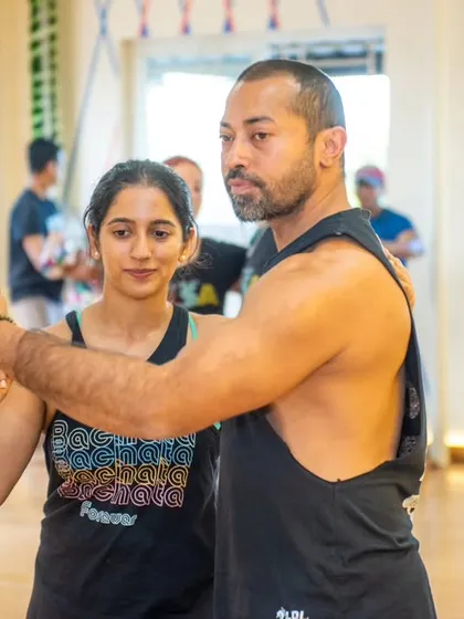 Here's Sai getting some one on one feedback during the workshop. Even as teachers, we are forever students, always eager to learn and grow from the best.