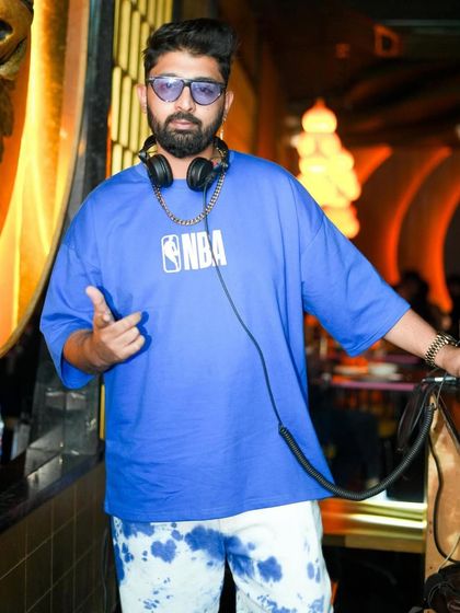 Rocking an NBA shirt for a Saturday night gig at Badmaash.