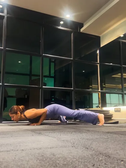 The chaturanga, or low plank, is a powerful pose for building upper body and core strength. It's a key transition in many of my yoga-inspired flows.