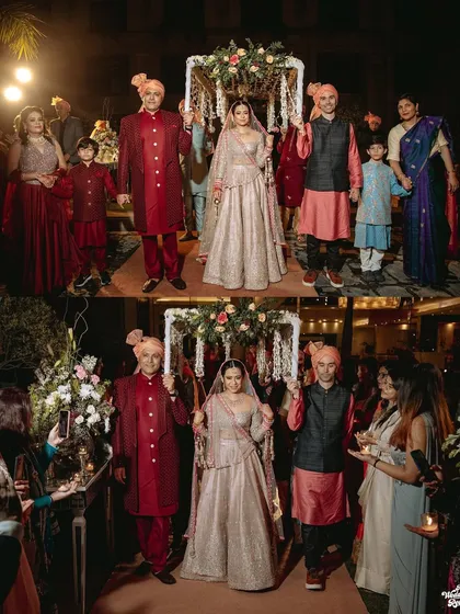 The bride's grand entrance with her family, a traditional and emotional part of the wedding.