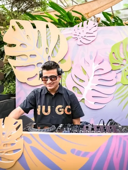 My setup for a tropical-themed Mehendi party. The music was curated to match the fun, leafy decor.