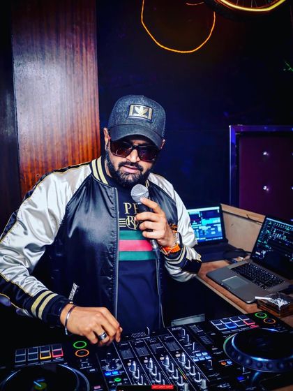 On the mic and in the mix at a club in Dubai. I always interact with the crowd to keep the party going.