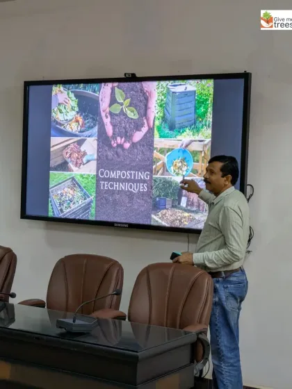 Explaining different composting techniques during a workshop. Our nature education programs cover a wide range of topics, from soil health to waste management.