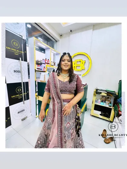 The full look of a client ready for her engagement. She looks happy and confident in her beautiful lehenga and subtle, elegant makeup.