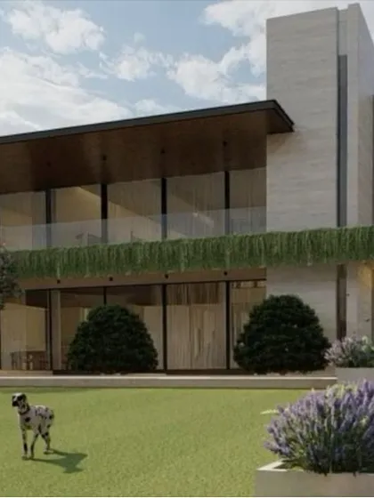 My work often starts from the outside in. I design homes, not just interiors, focusing on how the building interacts with its environment. This modern residence uses clean lines, large glass panels, and natural materials to create a seamless connection between the indoor and outdoor spaces.