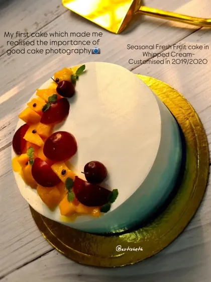 An early design of mine, this seasonal fresh fruit cake taught me the importance of good photography. It features a crescent of fresh mangoes and cherries.