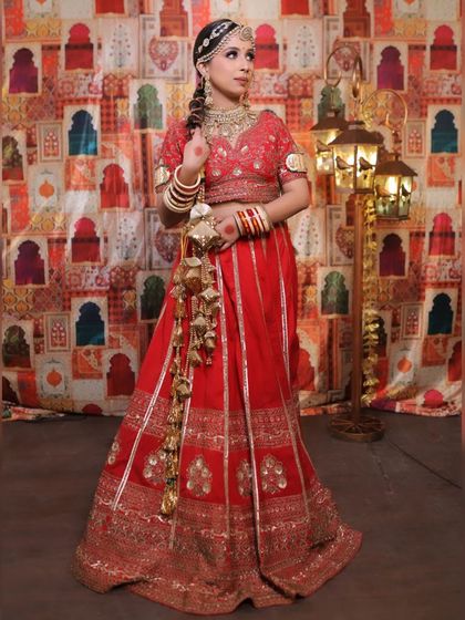 Timeless Red & Rani Pink Lehengas photo 22