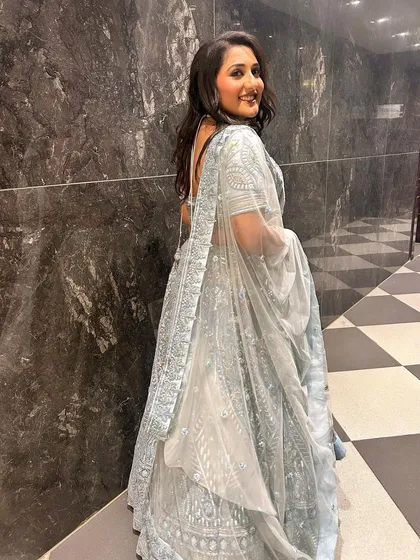 More pictures of my client enjoying her event in the powder blue lehenga. It's so rewarding to see my outfits become a part of someone's happy memories.