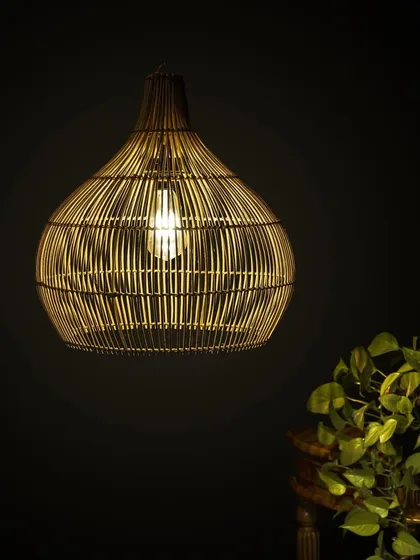 Here is the quintessential warm glow of a natural bamboo lamp. This teardrop pendant is one of my most beloved designs, perfect for casting soft, diffused light over a dining table or in a reading nook.