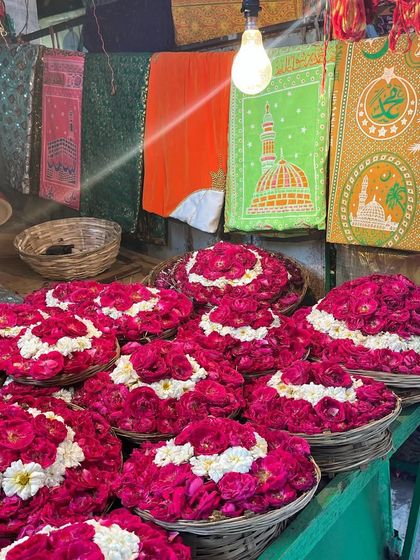 The beautiful chaos of a flower market at the Ajmer Sharif Dargah. I love visiting spiritual places where everyone is equal.