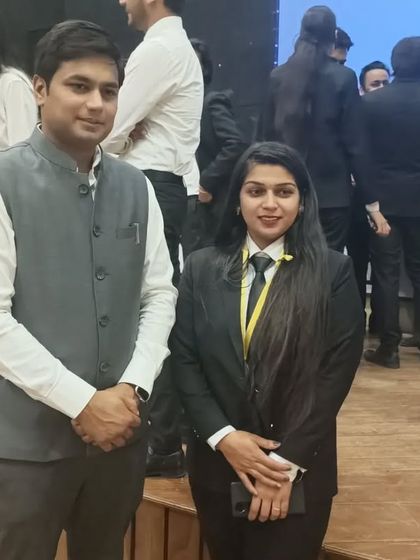With a participant at the moot court competition. I make it a point to interact with students and offer them encouragement.