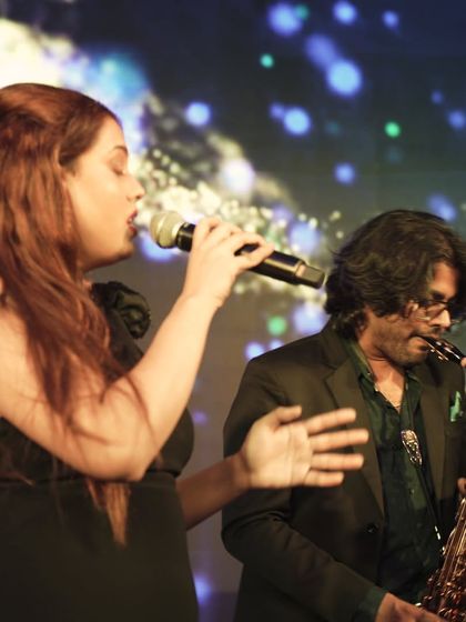 Singing alongside the incredible Elton Fernandes on saxophone. Our trio setup, featuring vocals, guitar, and sax, adds a rich, soulful layer to any event.