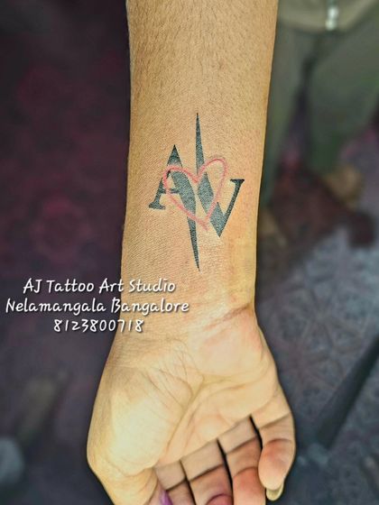 A graphic design of the initials 'A' and 'V' with a heart, perfect for a couple.