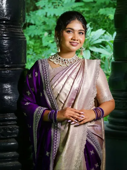 A full-length view of the lavender saree look, showing the elegant drape and the bride's confident posture.