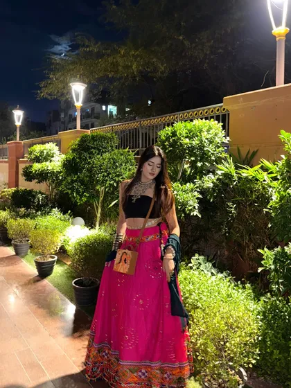 A full-length shot of the colorful and fun Navratri outfit.