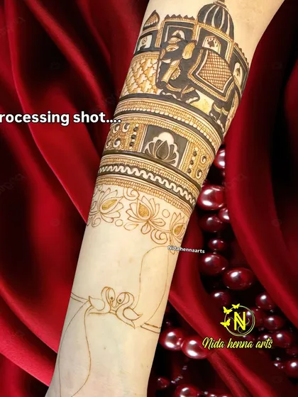 This processing shot shows a portion of a bridal arm design. It features a majestic elephant and palace architecture, demonstrating the rich, traditional elements I incorporate into my work.