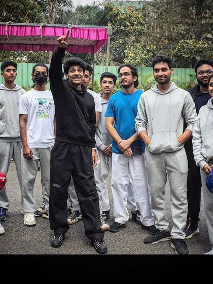 Leading my team with pride. We are a mix of beginners and advanced students, all working towards the same goal of self-improvement.