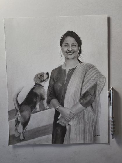 A finished A3 portrait of a woman with her adorable beagle. This piece, which took 16 hours, captures the loving gaze between them.