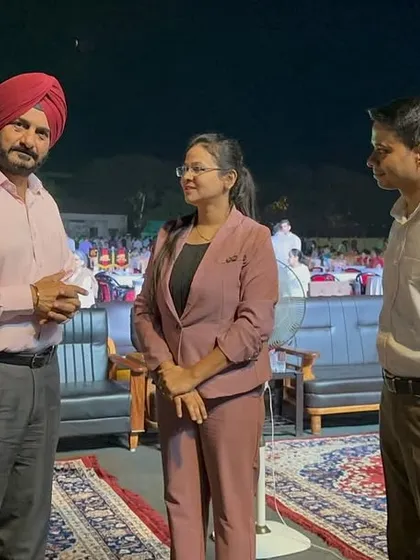 Posing with my partner Kundan and Lt. Gen. H. S. Kahlon after a successful show. We work together to ensure every performance is a memorable tribute.