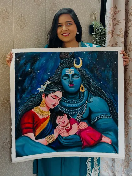 Here I am, holding the finished Shiv Parivar painting. It’s one of my larger pieces, and I’m so happy with how the colors and emotions came together.