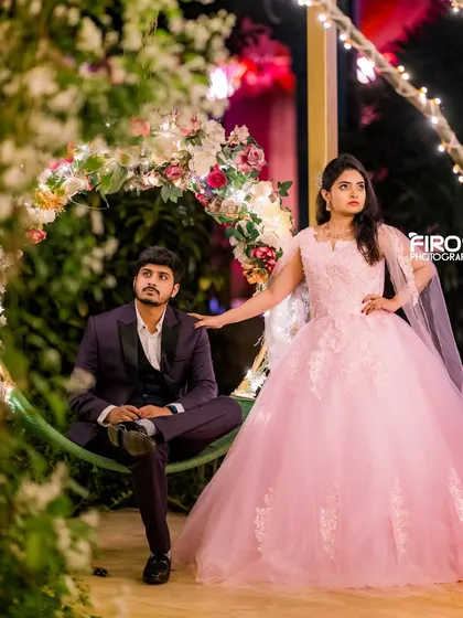A candid moment captured on our floral swing, where the soft glow of the string lights creates a warm and intimate atmosphere for a pre-wedding shoot.