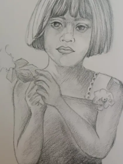 Sketching is the foundation of so much art, and I teach my students to see the world in lines and shadows. This beautiful pencil portrait was done by a student learning to capture expression and detail. It is a wonderful example of the realistic drawing skills we practice in our weekly lessons.
