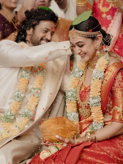 Another beautiful ritual from the wedding. The bride's smile and glowing makeup shine through.