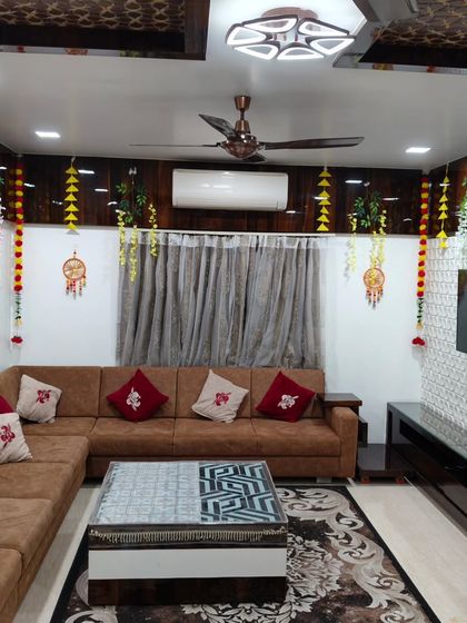 This image shows how my festive decorations can be integrated into a modern living room. I used hanging garlands and dream catchers to add a traditional touch without overwhelming the space.
