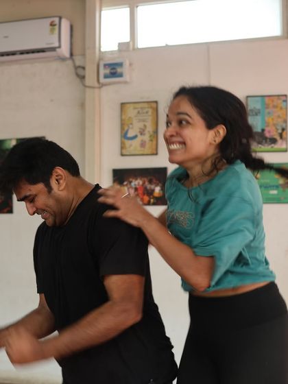 A playful moment during rehearsals for "Gretel."