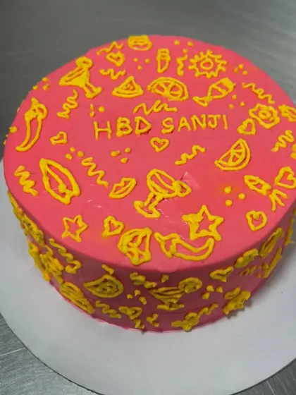 I was trying to do some intricate piping work on this cake and my shaky hands had other plans, but I still like how it turned out. It's a bright, fun, and effective design for a birthday.