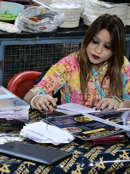 Our co-sponsor from Misk Khushbu managing the reservations. Our partners are hands-on in making the event a success.