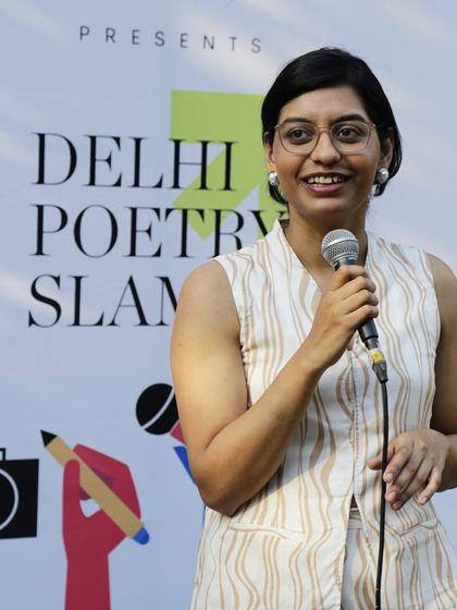Our founder, Saumya, performing a personal poem about choosing an artistic career. Our showcases feature seasoned poets who share profound and relatable stories.