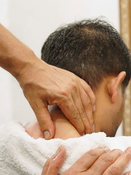Our therapist targets pressure points in the neck to relieve stiffness. This is part of our comprehensive head massage service, ensuring you leave feeling lighter and more relaxed.