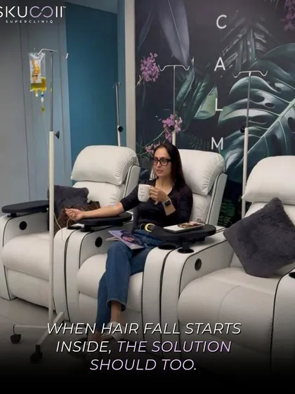 Sometimes, the solution to hair fall begins from within. This client is relaxing in our private lounge while receiving a customized IV drip, formulated with essential vitamins and nutrients to target the root causes of hair loss.