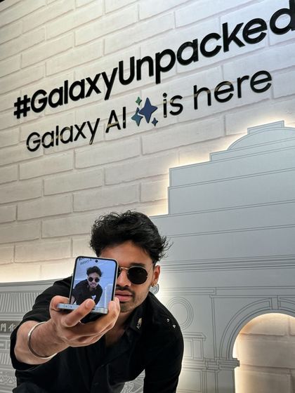 A creative selfie with the Samsung Galaxy Z Flip at the Unpacked event. This image is playful and engaging, perfectly suited for social media promotion.