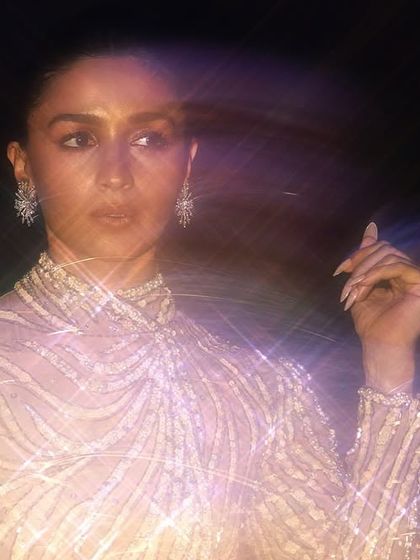 Soap nails for Alia Bhatt's glamorous night in Dubai. This sparkling, translucent look was designed to catch the light and add a touch of magic to her sequined outfit.