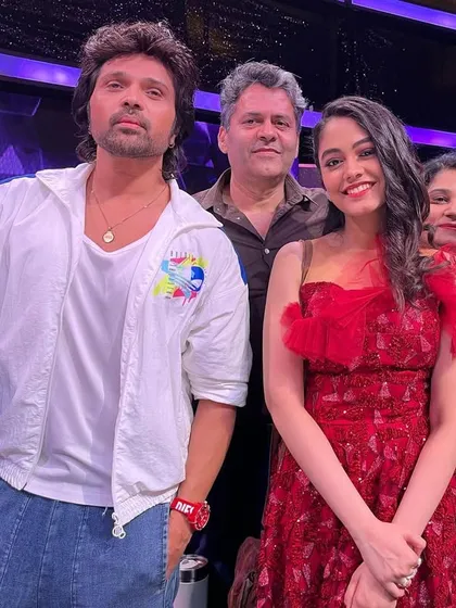 With judge Himesh Reshammiya and my family. Having their support on set meant the world to me. It was an honor to learn from such an esteemed panel of judges.